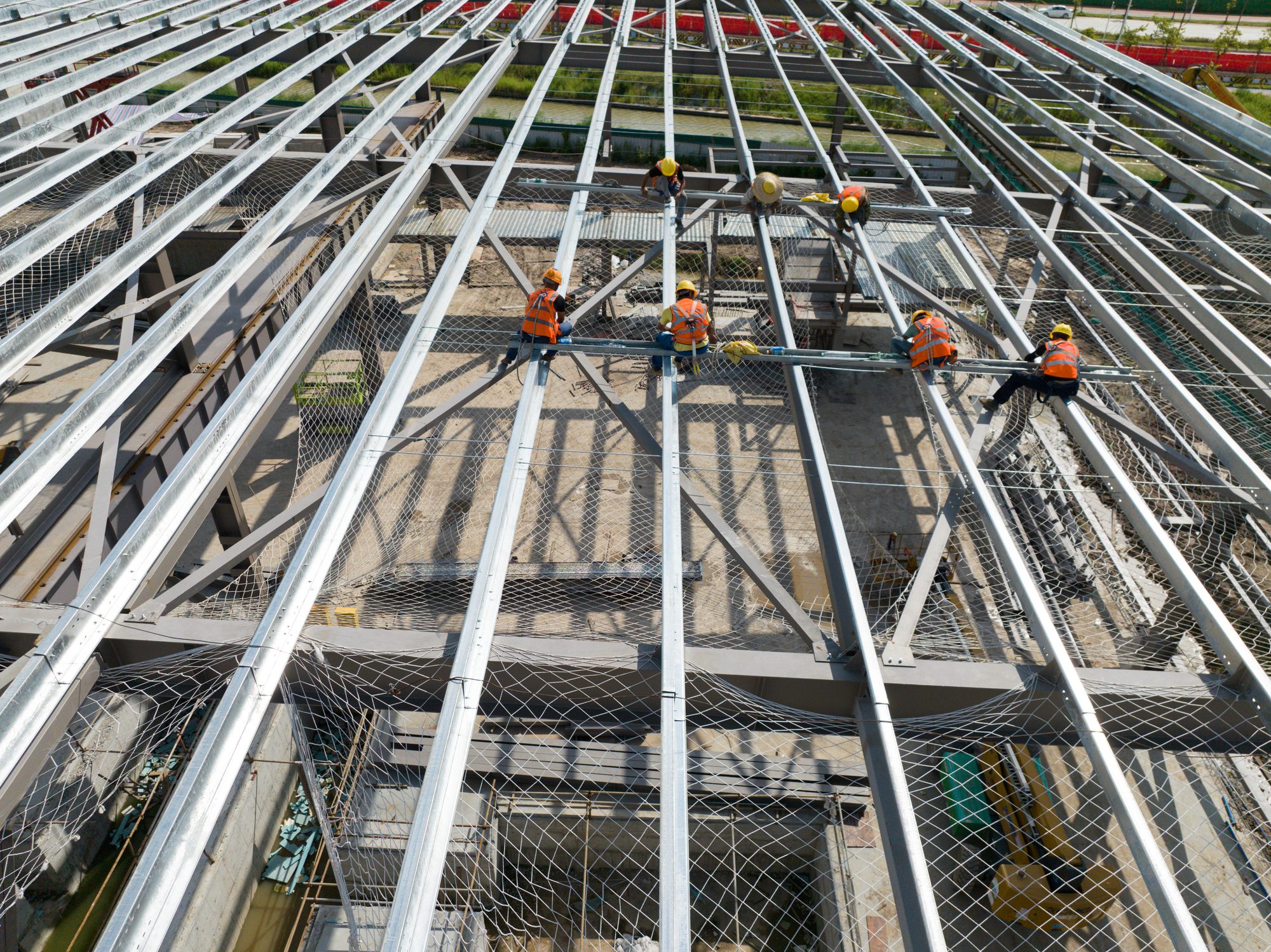 Construction workers on steel beams